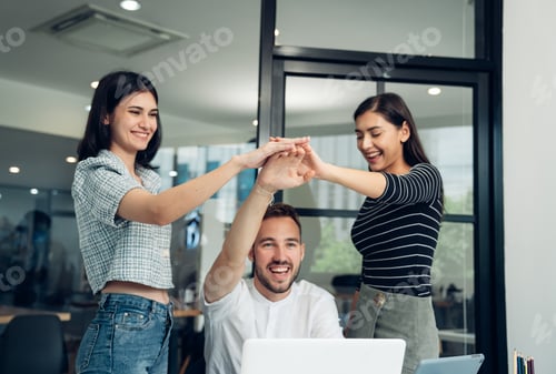 Preview: Happy diverse friends watching funny video together at meeting.