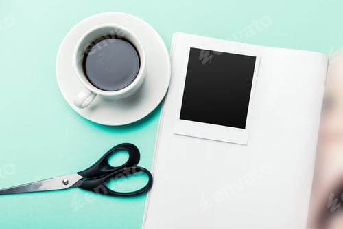 Preview: coffee and photo blank on the table.