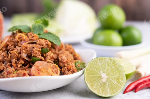 Preview: Spicy minced pork in a white plate.