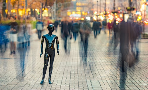 Preview: The black mannequin stands on the street among the stream of people