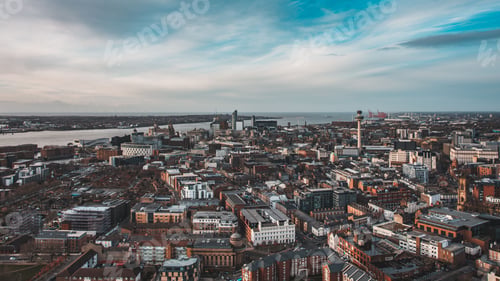Preview: High angle shot of city buildings with the sea in the background in Liverpool, United Kingdom