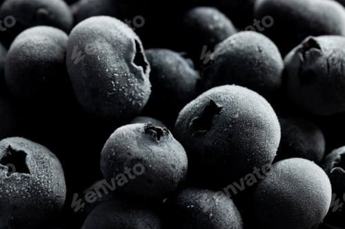 Preview: Micro of blueberries in glass container with copy space