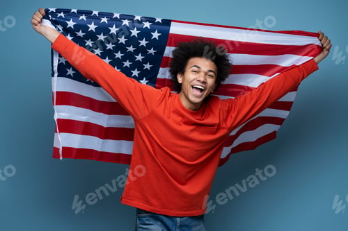Preview: African American man holding American flag. Emotional patriot celebration Independence day