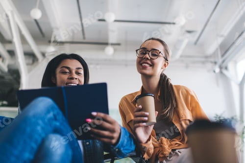 Preview: Business women working in open space office