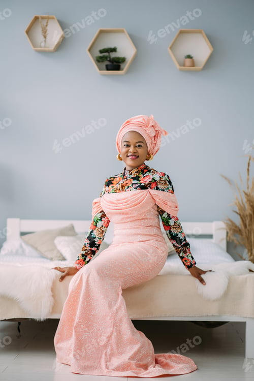 Preview: Beautiful smiling woman with bright makeup against light studio background. Studio shot of female