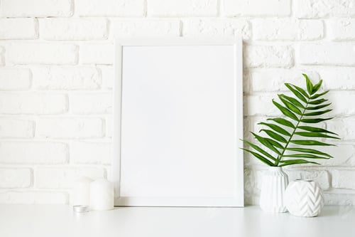 Preview: Poster template mock up with white vases and leaves on white brick wall background
