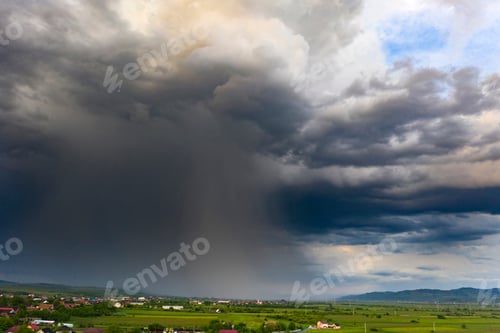 Preview: Summer storm over the fields.