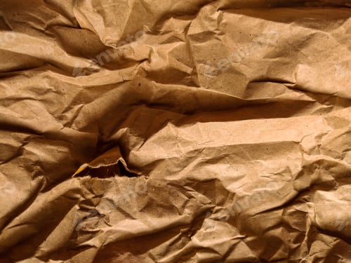 Preview: Crumpled Brown Paper Texture Background with Rips