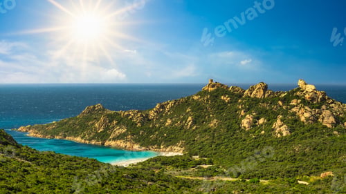 Preview: Coastal landscape with clear blue sky and turquoise sea.
