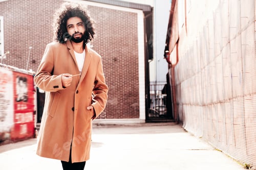 Preview: Handsome man posing outdoors