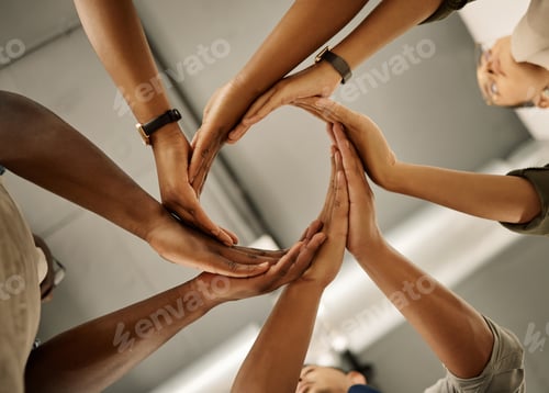 Preview: Closeup of hands of group of businesspeople in a circle. Diverse designers united in support. Fashi