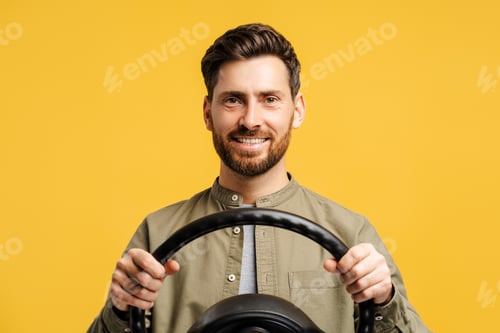 Preview: Portrait of handsome, smiling, bearded middle aged Hispanic man holding helm, looking at camera