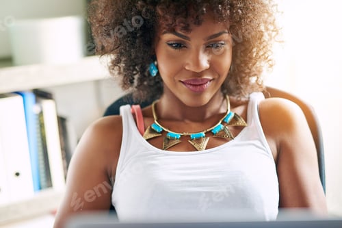Preview: Smiling businesswoman hard at work