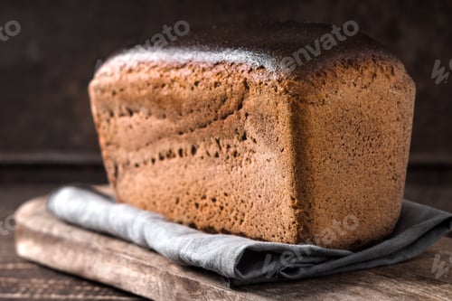 Preview: Rye bread on the wooden board horizontal