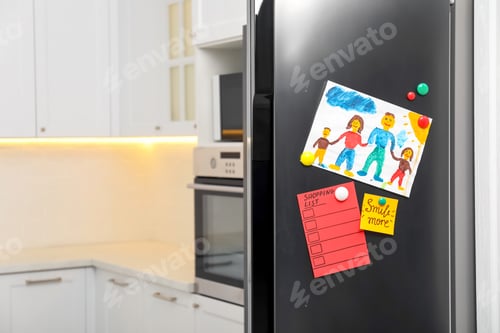 Preview: Family Drawing on Refrigerator in a Bright Kitchen