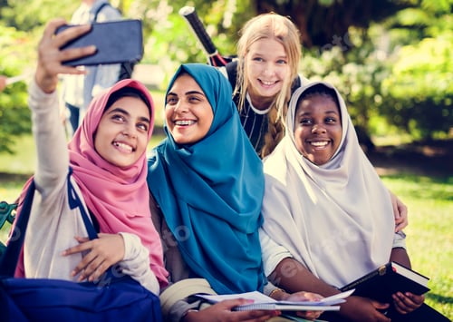 Preview: Group of students using mobile phone