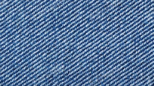 Preview: Texture of blue rough grunge cotton inside out denim fabric close up, textured textile background
