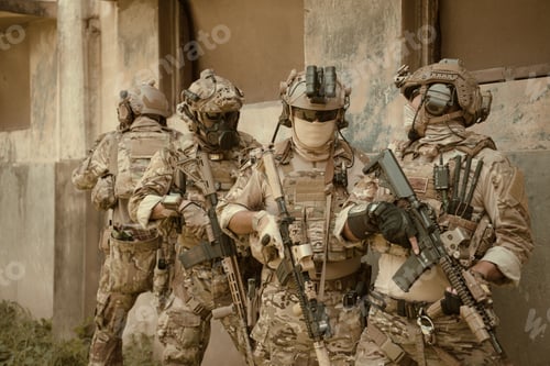 Preview: Professional marine soldiers training with weapon on a military range.