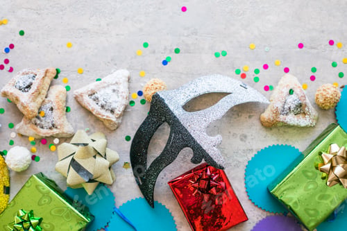 Preview: Purim celebration concept on white background, flat lay with hamantaschen cookies and purim mask