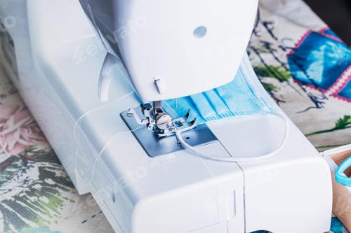 Preview: Sewing machine sewing masks for the COVID-19 pandemic.