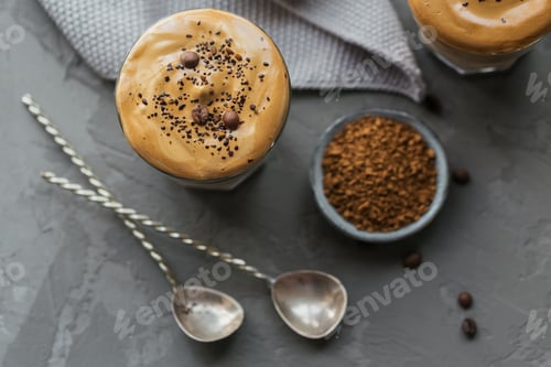 Preview: Glass of Iced Dalgona Coffee, trendy fluffy creamy whipped coffee and milk