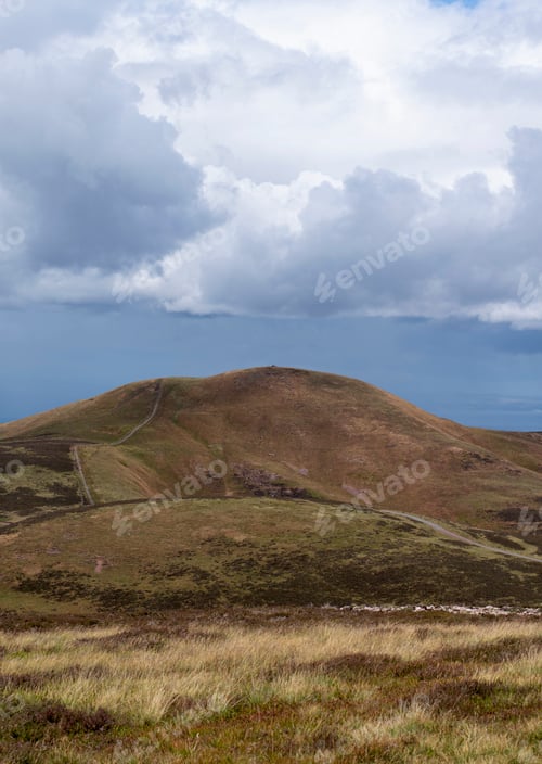 Preview: Cloudy view of the Pentland Hills in Scotland. Nature on a cold day