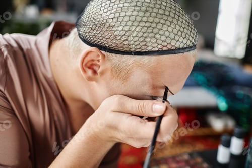 Preview: Drag Queen Doing Makeup Preparing for Stage Act