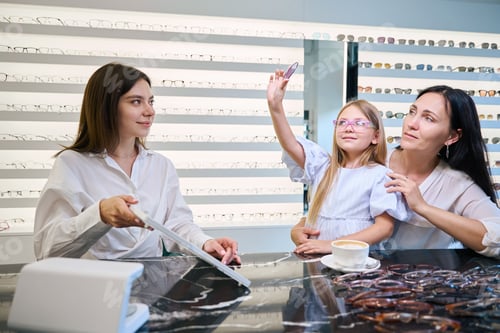 Preview: Kid picking out tinted lenses for new pair of spectacles