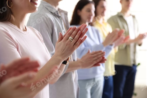 Preview: People applauding during meeting indoors, closeup view