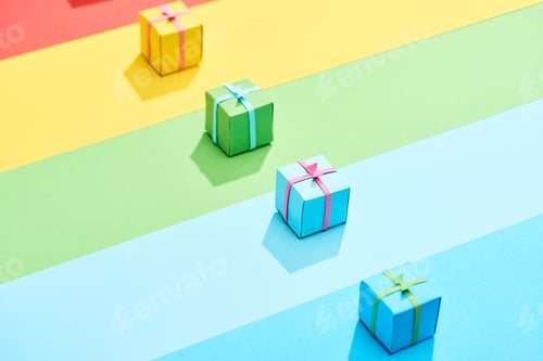 Preview: multicolored gift boxes on rainbow background