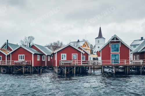 Preview: Traditional red rorbu houses in Reine, Norway