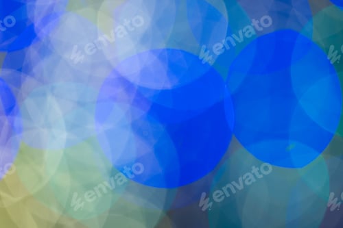 Preview: Multi coloured bokeh lights with copy space on dark background
