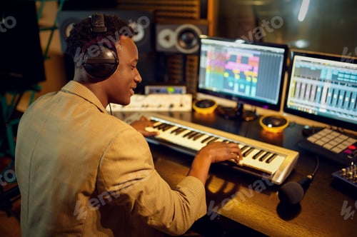 Preview: Male dj listening a record, recording studio