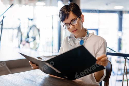 Preview: Young student woman preparing for an exam