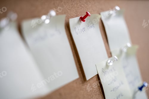 Preview: A lot of memos on pin board with pins