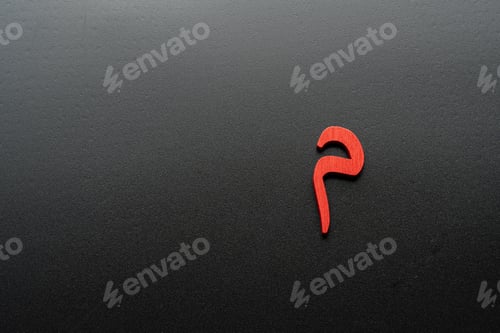 Preview: Image of Arabic letters made of wood on a black background
