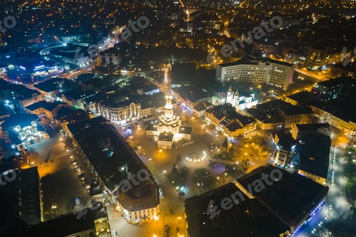 Preview: Aerial view of bright illuminated streets and buildings in Ukrainian Ivano-Frankivsk city center at