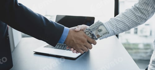 Preview: Government officials hand receiving bribe money from businessman in shaking hands