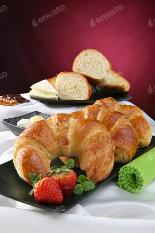 Preview: Still life with croissant, breakfast with pastry, fruit and jam.