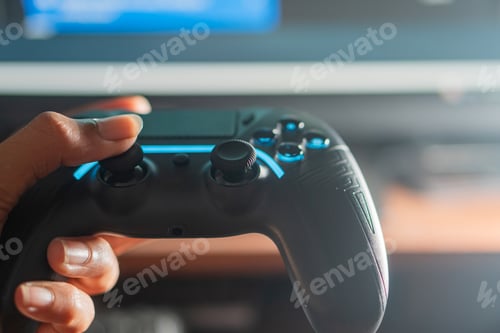 Preview: Close-up of a Hand Holding a Gaming Controller
