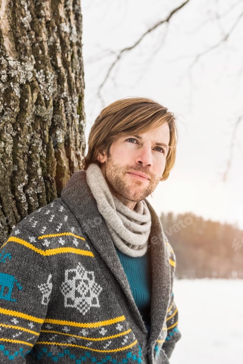 Preview: Portrait of man wearing knitted cardigan