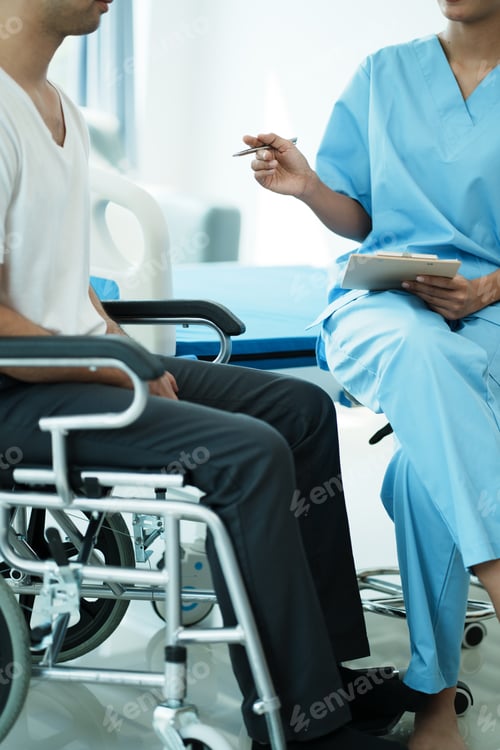 Preview: Female professional doctor talking and discussing with her patient in the clinic room.