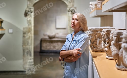Preview: Middle-Aged Female Visitor At The Art Or Archaeological Museum