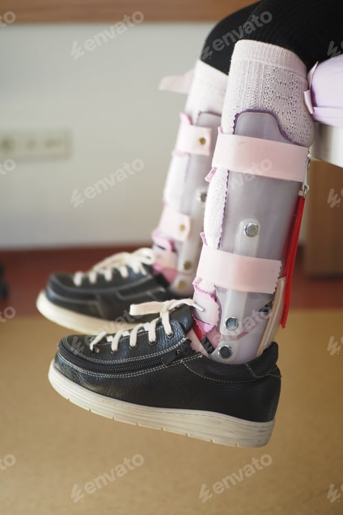 Preview: Child cerebral palsy disability, legs orthosis.