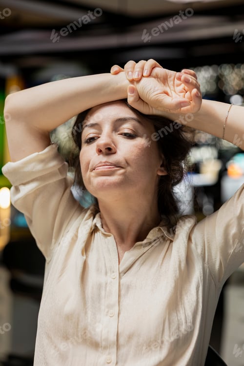 Preview: Woman employee doing overtime late at night struggling to finish tasks