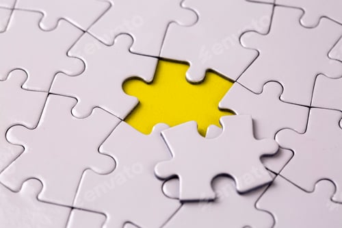 Preview: Missing jigsaw puzzle pieces. Business concept. Fragment of a folded white jigsaw puzzle