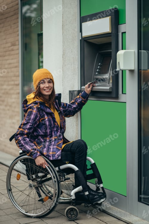 Preview: Woman with disability using credit card and atm machine