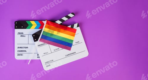 Preview: Two Clapper board and rainbow pride flag on purple or violet background.