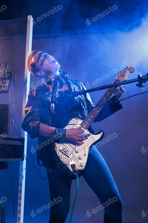 Preview: Female punk rocker singing rock at guitar