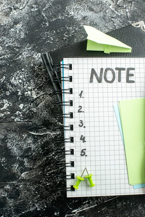 Preview: top view open notepad with note and numbers on gray background job copybook school color student